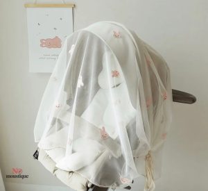 Moustiquaire poussette motif lapinou pour protéger bébé